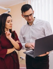 A dentist embracing digital tools, representing the transformation from traditional to digital marketing.