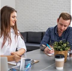 A dentist reviewing a custom digital marketing plan created by Dental Brando.